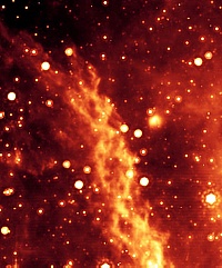 Der Doppel-Helix-Nebel in der Nähe des Schwarzen Loches im Zentrum unserer Galaxie. Quelle: NASA/JPL-Caltech/M. Morris (UCLA)