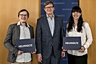 Foto: Dr. Lukas Körber and Dr. Anna Vanderbruggen receive Helmholtz Doctoral Prizes 2024 from Helmholtz President Prof. Otmar Dr. Wiestler ©Copyright: David Marschalsky